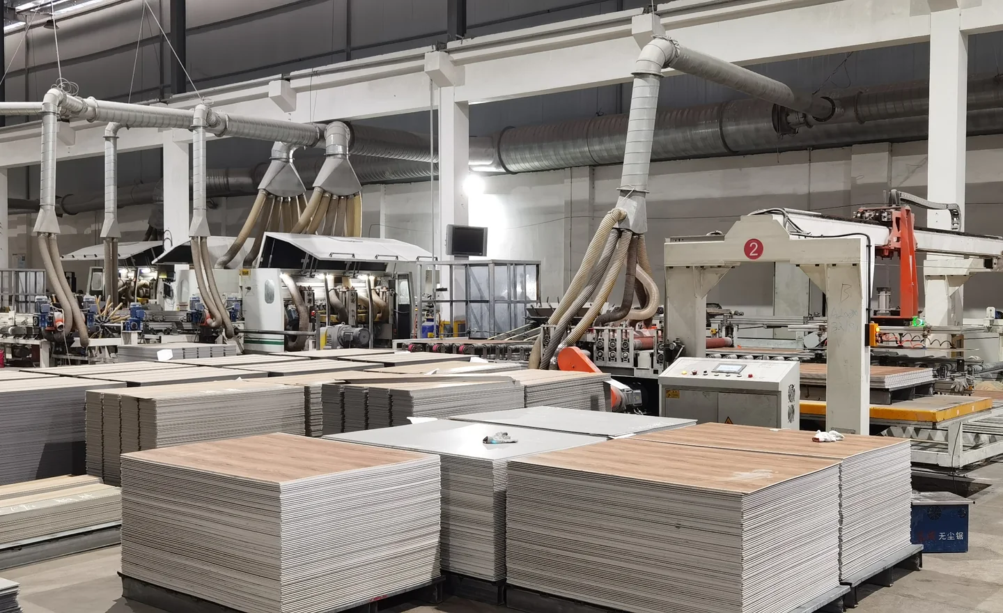 Wide view of flooring production equipment